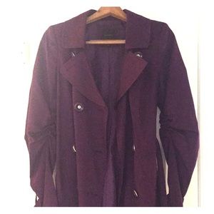 Purple belted trench coat with pleats